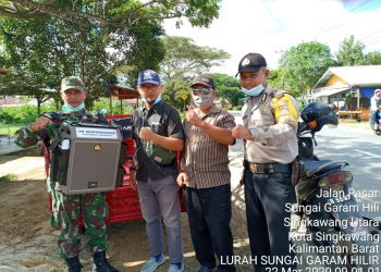 Lurah Sungai Garam Hilir dan unsur TNI Polri
