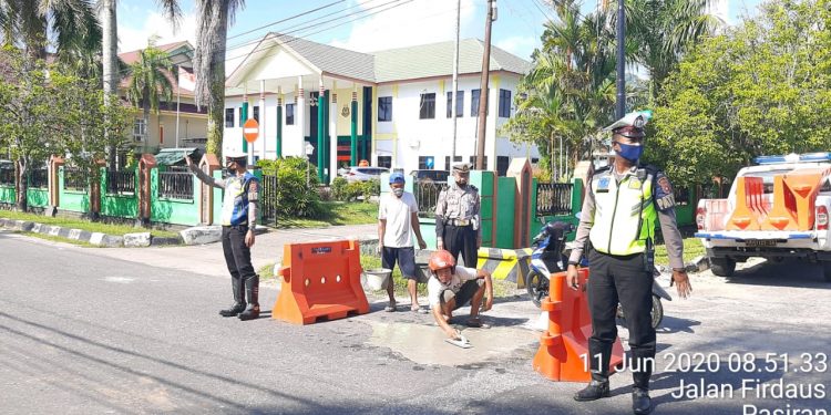 Tambal Jalan Berlubang