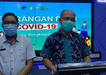 Humas Gugus Tugas Covid-19 Singkawang Kadiskes dr Barita dan Kadiskominfo Ahyadi